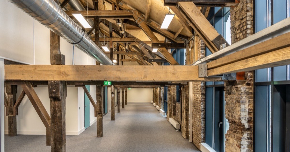 Exposed oak ceiling beams in a period property interior